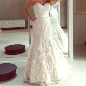 Brand new wedding gown Never altered never used!